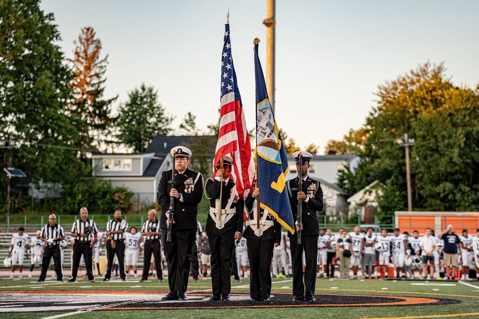 Linden High School’s NJROTC color guard presents the colors before the Tigers’ home opener.