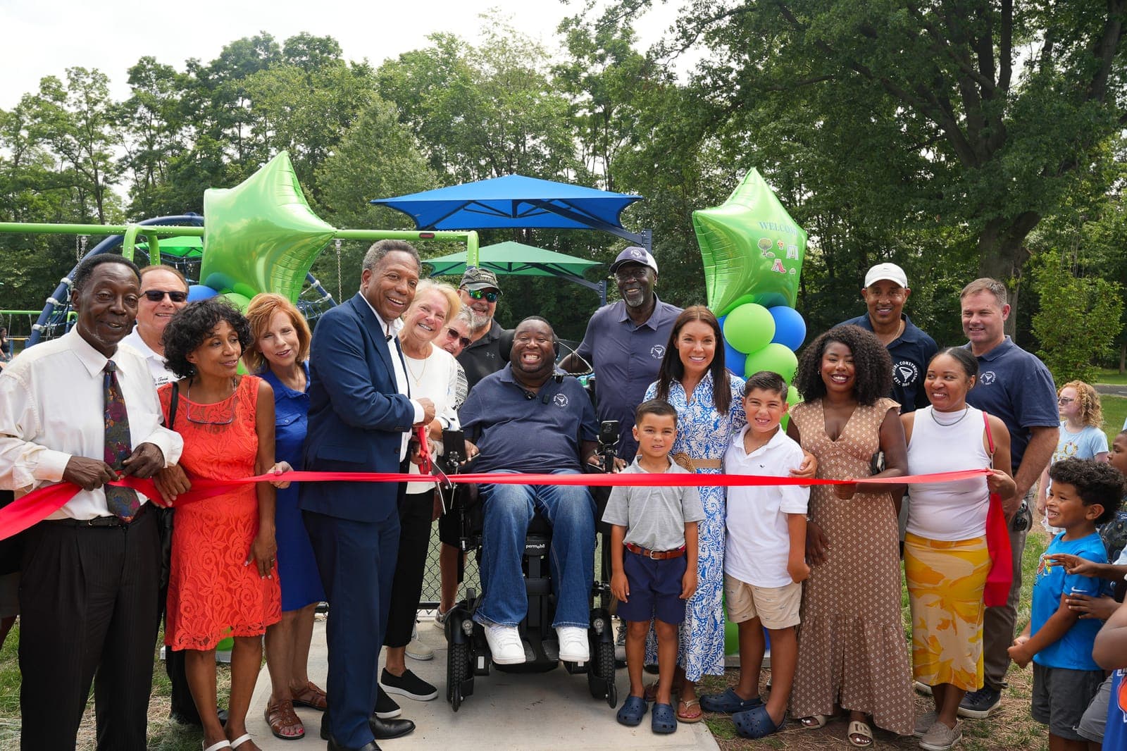 Residents and city representatives marked the Milkosky Park ribbon cutting.